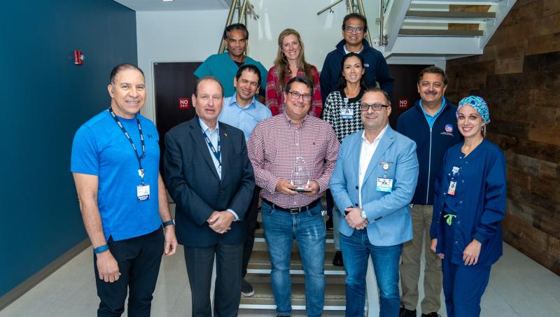 Dr. Saliba Clinical Excellence Award presentation attendees shown are in back (l-r) Madhu Prattipati, MD; Erin Fletcher, DO; and Michael Ramjattansingh, MD. In the middle are Joydeep Haldar, MD; Dawn Dillon, DO; and Vikas Batra, MD. In front are Alberto R. Rosa, MD; Paul C. Peet, MD; honoree Kevin D. Bristowe, MD; Paul Sierzenski, MD; and Jillian Dashiell, MD. SUBMITTED PHOTO